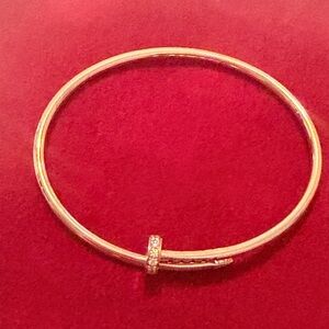 Cartier Rose Gold Bracelet with Diamonds.